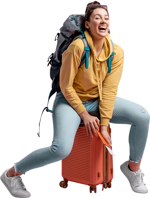 Traveler with backpack and suitcase